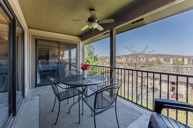 balcony with ceiling fan and visible vents