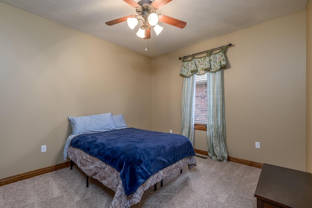 bedroom featuring carpet flooring, ceiling fan, and baseboards