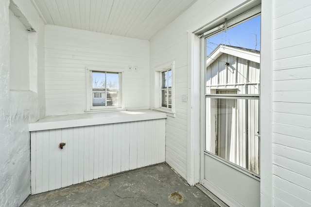 unfurnished sunroom with a healthy amount of sunlight