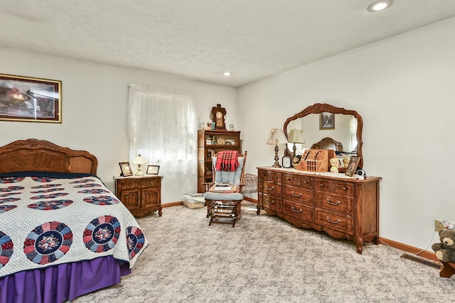 carpeted bedroom featuring recessed lighting, visible vents, a textured ceiling, and baseboards