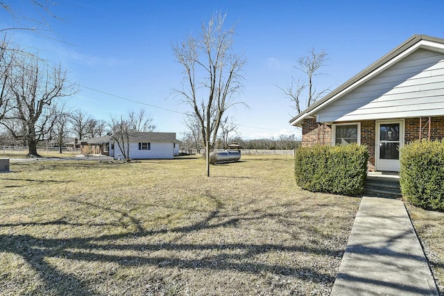 view of yard with fence