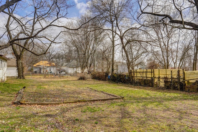 view of yard with fence