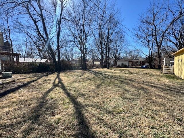 view of yard with fence