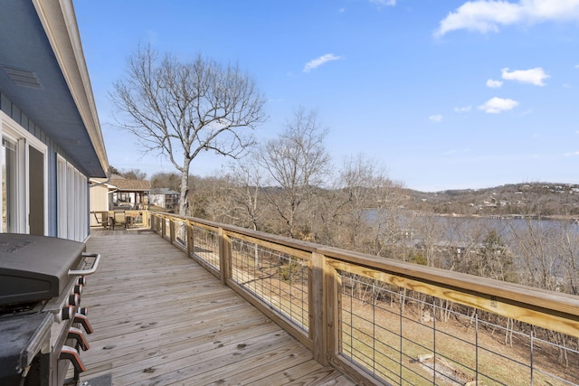 wooden terrace with grilling area