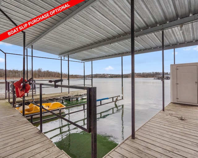 dock area with a water view and boat lift