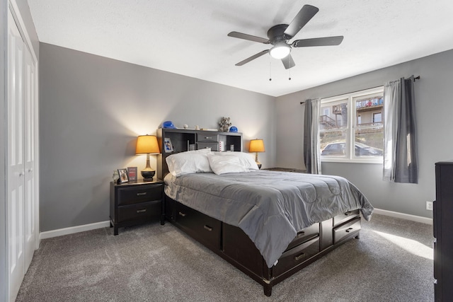 bedroom featuring a ceiling fan, carpet flooring, and baseboards