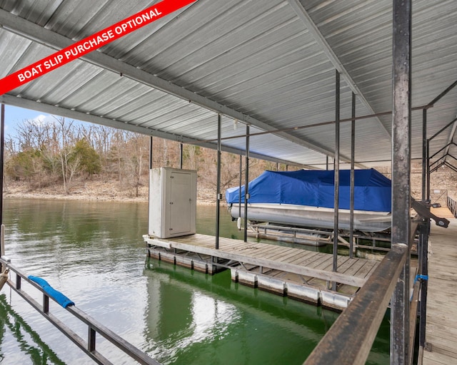 dock area with a water view and boat lift