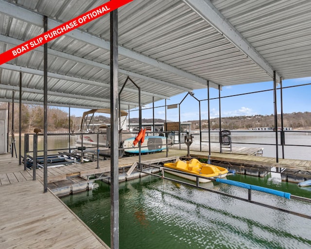 dock area featuring a water view