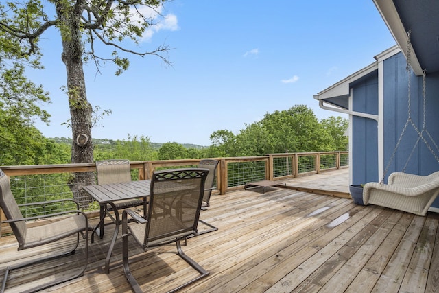 deck featuring outdoor dining space