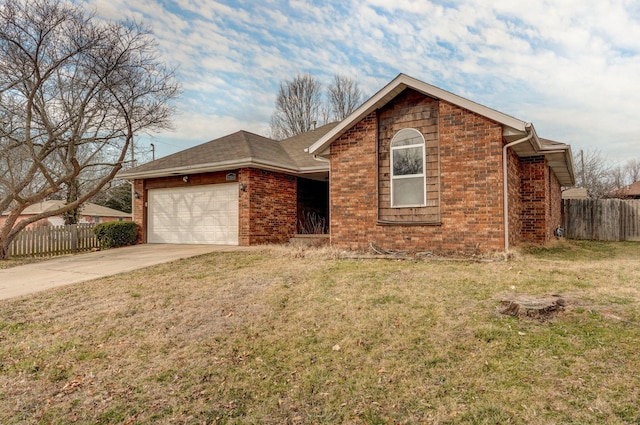 ranch-style home featuring a front yard, brick siding, fence, and driveway