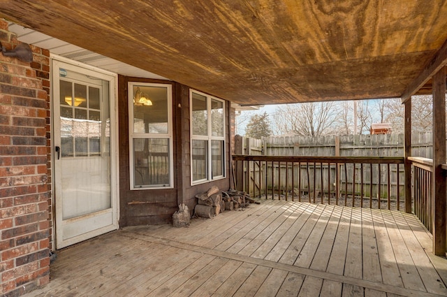 wooden deck featuring fence