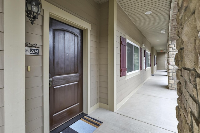 entrance to property with covered porch