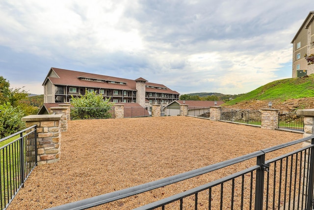 view of front of home with fence