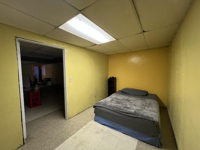 bedroom featuring a paneled ceiling