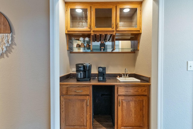 bar featuring a sink