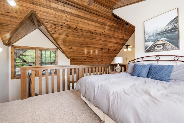 bedroom featuring lofted ceiling, wood ceiling, and carpet flooring