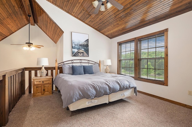 carpeted bedroom with vaulted ceiling with beams, wood ceiling, baseboards, and a ceiling fan