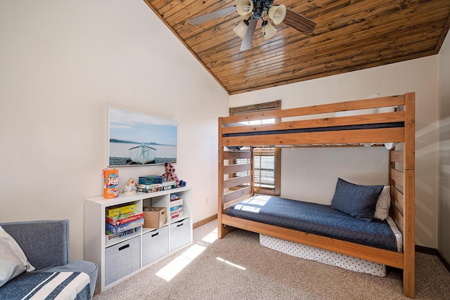 carpeted bedroom featuring lofted ceiling, wooden ceiling, ceiling fan, and baseboards