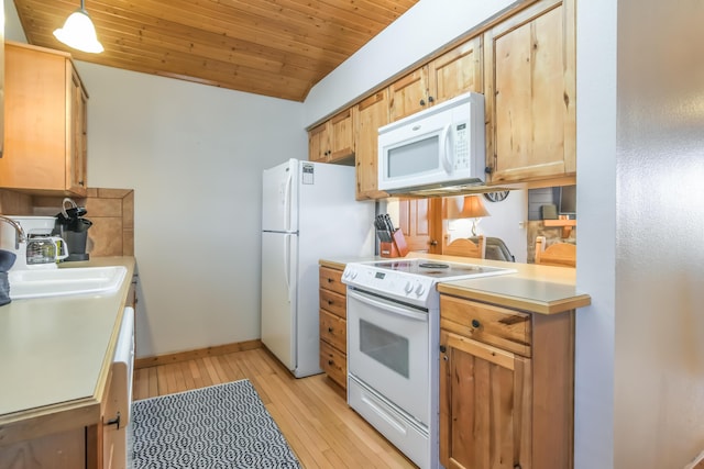 kitchen with light countertops, wooden ceiling, a sink, light wood-type flooring, and white appliances