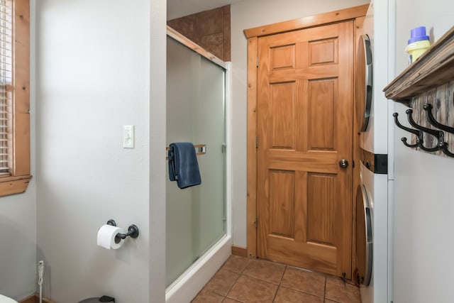 bathroom featuring a stall shower and tile patterned floors