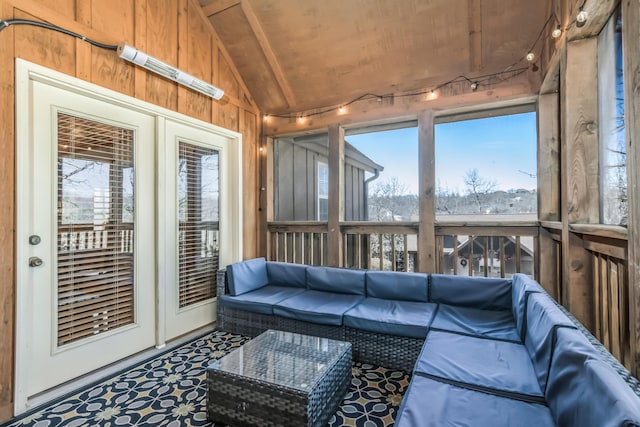 sunroom / solarium featuring wooden ceiling and vaulted ceiling