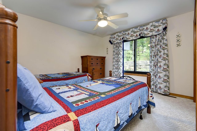 245 Wildflower Rd, Kimberling City, MO 65686 - carpeted bedroom with a ceiling fan and baseboards