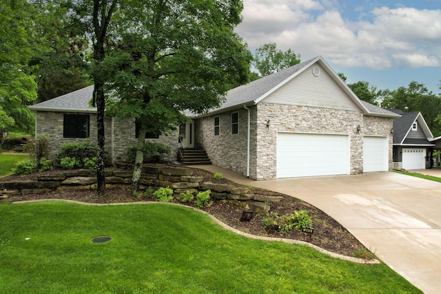 245 Wildflower Rd, Kimberling City, MO 65686 - ranch-style house with an attached garage, stone siding, a front yard, concrete driveway, and a shingled roof