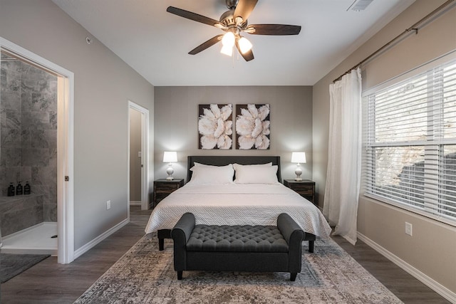 bedroom with ceiling fan, baseboards, and wood finished floors