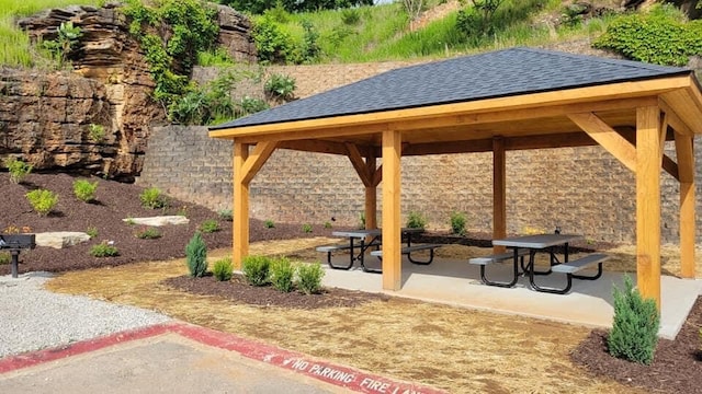 view of home's community with a patio and a gazebo