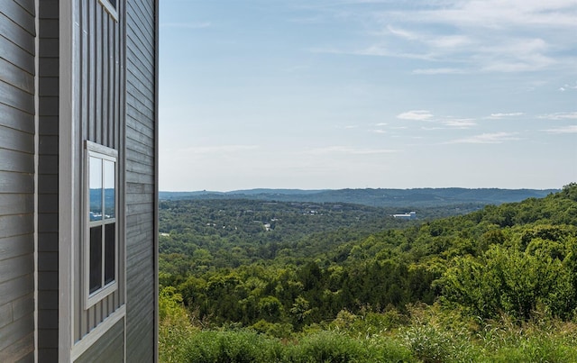 property view of mountains featuring a wooded view