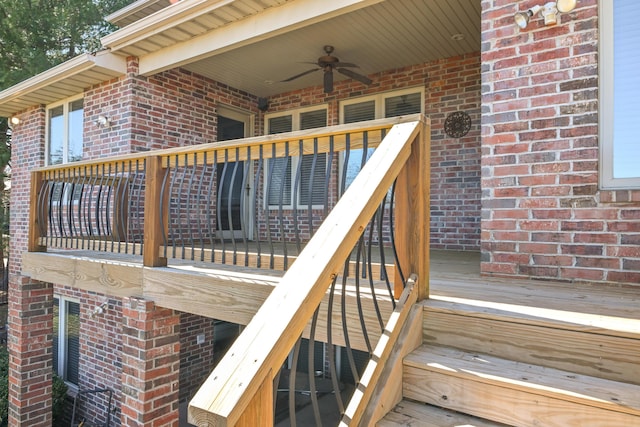 exterior space with ceiling fan