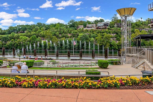 surrounding community featuring a water view