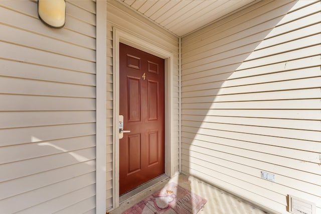 doorway to property featuring crawl space