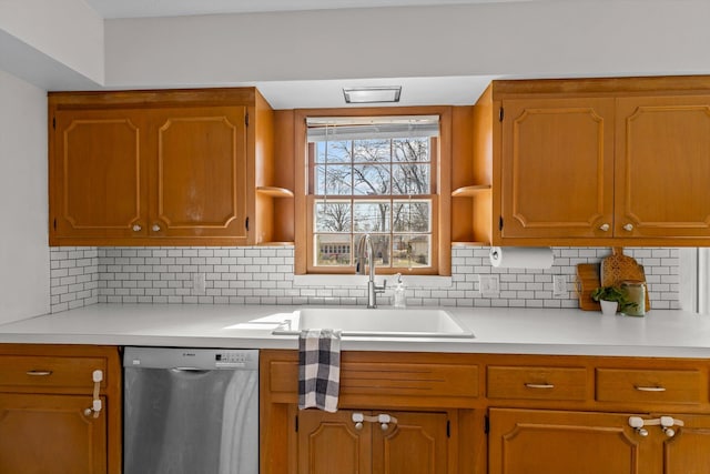 kitchen with open shelves, light countertops, decorative backsplash, a sink, and dishwasher