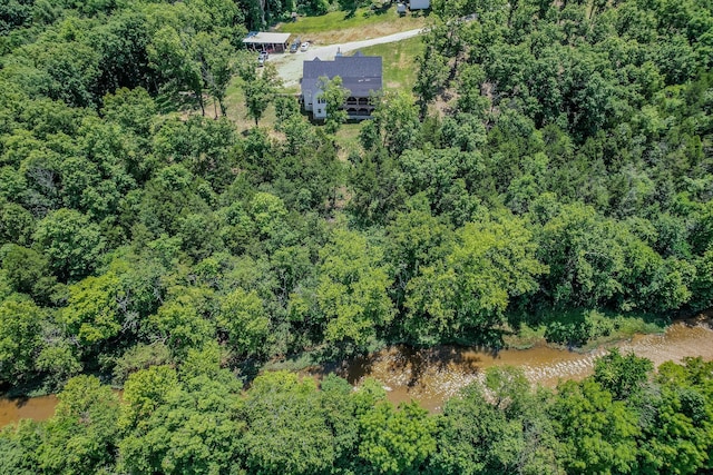 bird's eye view featuring a view of trees