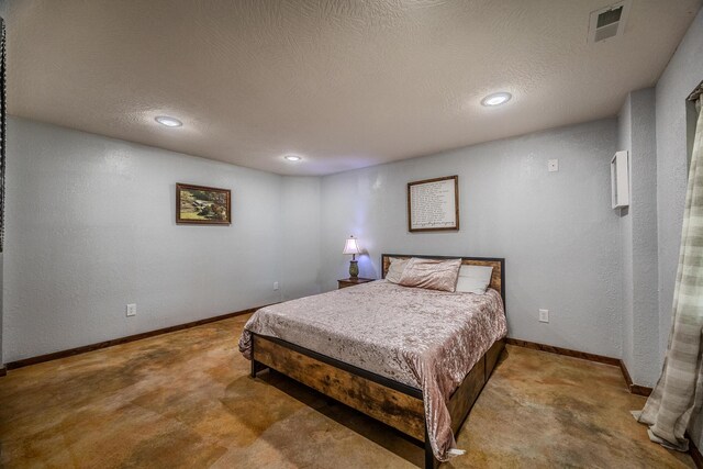 bedroom with recessed lighting, visible vents, a textured wall, a textured ceiling, and baseboards