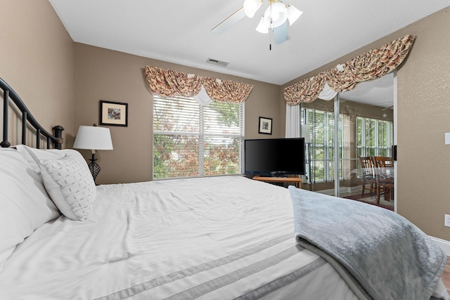 bedroom featuring visible vents and a ceiling fan