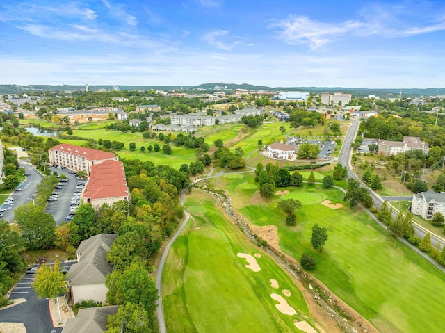 drone / aerial view featuring view of golf course