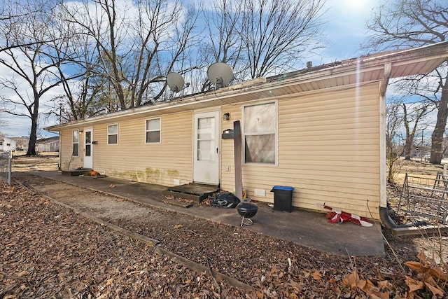 back of property with entry steps