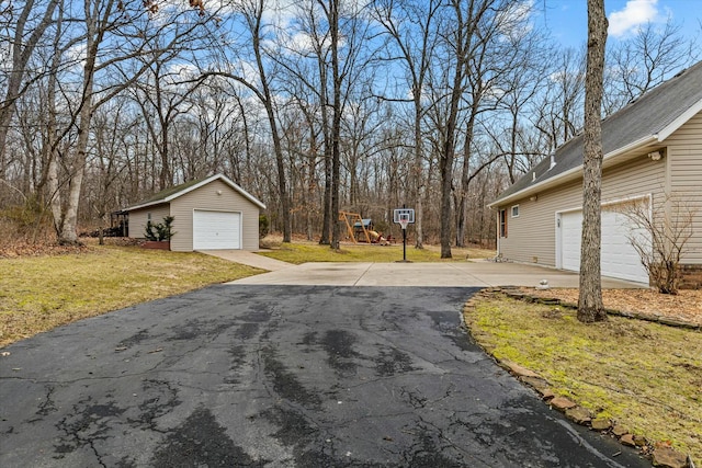 view of road with driveway