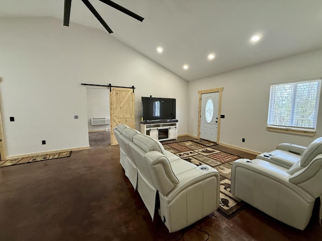 living room with a barn door, concrete floors, baseboards, and recessed lighting