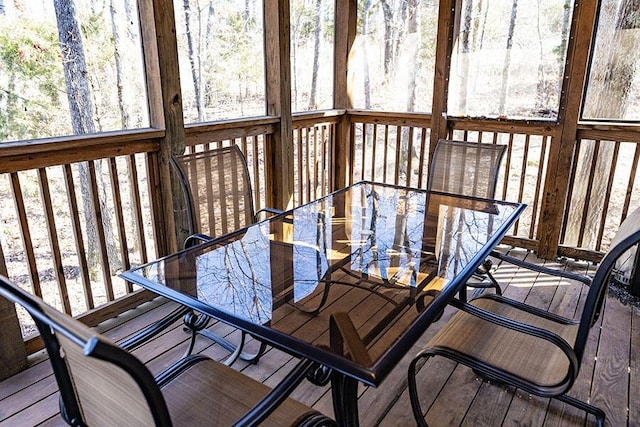 wooden deck with outdoor dining area