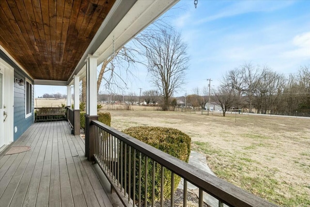 deck featuring a yard