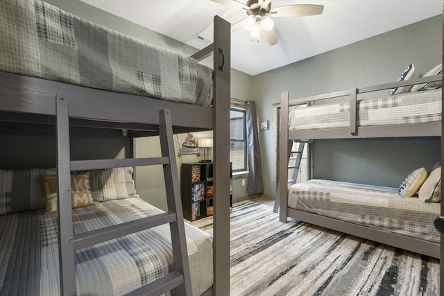 bedroom featuring wood finished floors and a ceiling fan