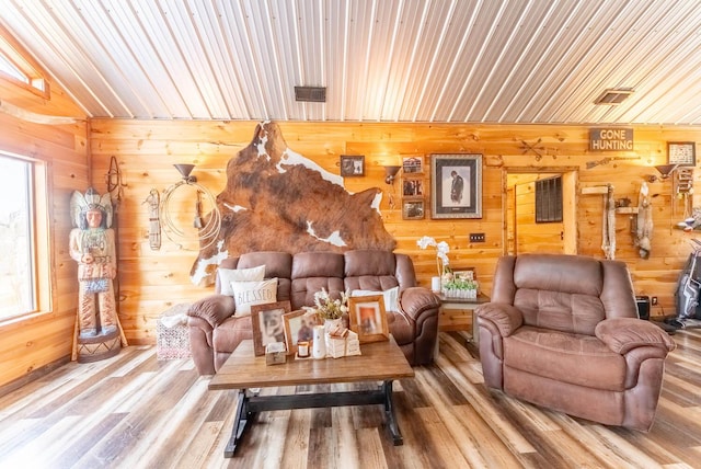 80 Serenity Ct, Gepp, AR 72538 - living room with wood walls, wood finished floors, and visible vents