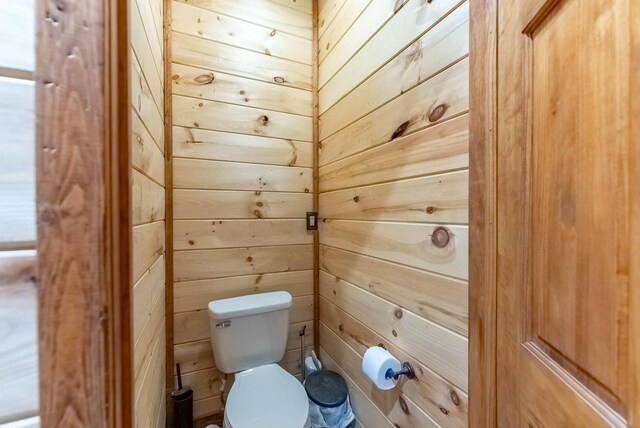 80 Serenity Ct, Gepp, AR 72538 - bathroom featuring wood walls and toilet