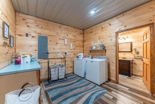 80 Serenity Ct, Gepp, AR 72538 - clothes washing area with laundry area, a sink, independent washer and dryer, electric panel, and light wood finished floors