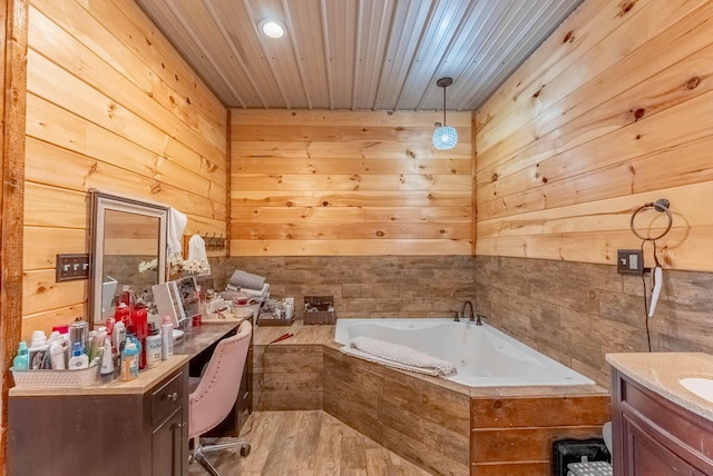80 Serenity Ct, Gepp, AR 72538 - bathroom featuring wooden walls, wood ceiling, a jetted tub, and vanity