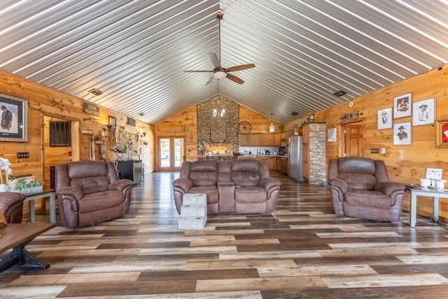 80 Serenity Ct, Gepp, AR 72538 - living room with lofted ceiling, wood finished floors, and wooden walls