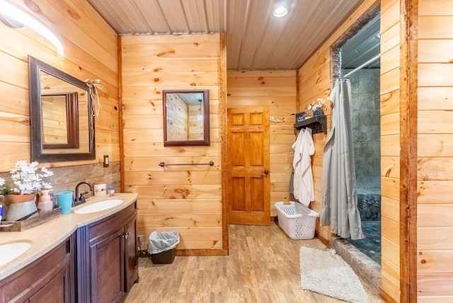 80 Serenity Ct, Gepp, AR 72538 - full bath featuring a sink, wood finished floors, wood ceiling, a shower stall, and double vanity
